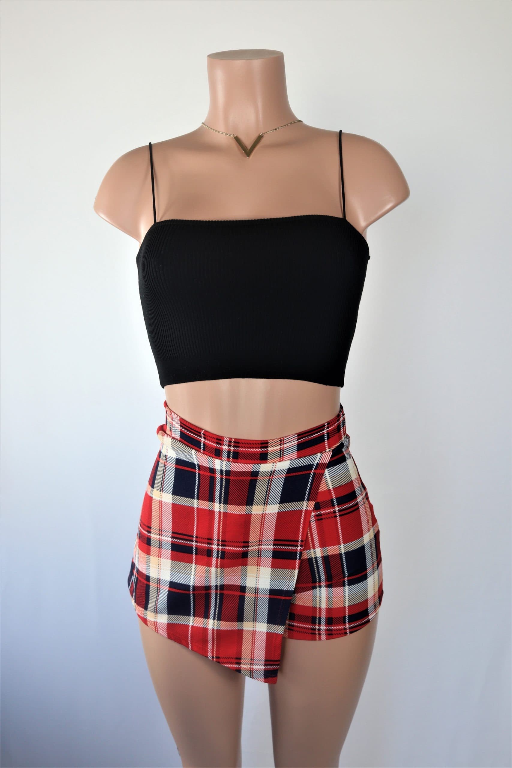 Dion Plaid Skort - High waisted black red pink white plaid skort.