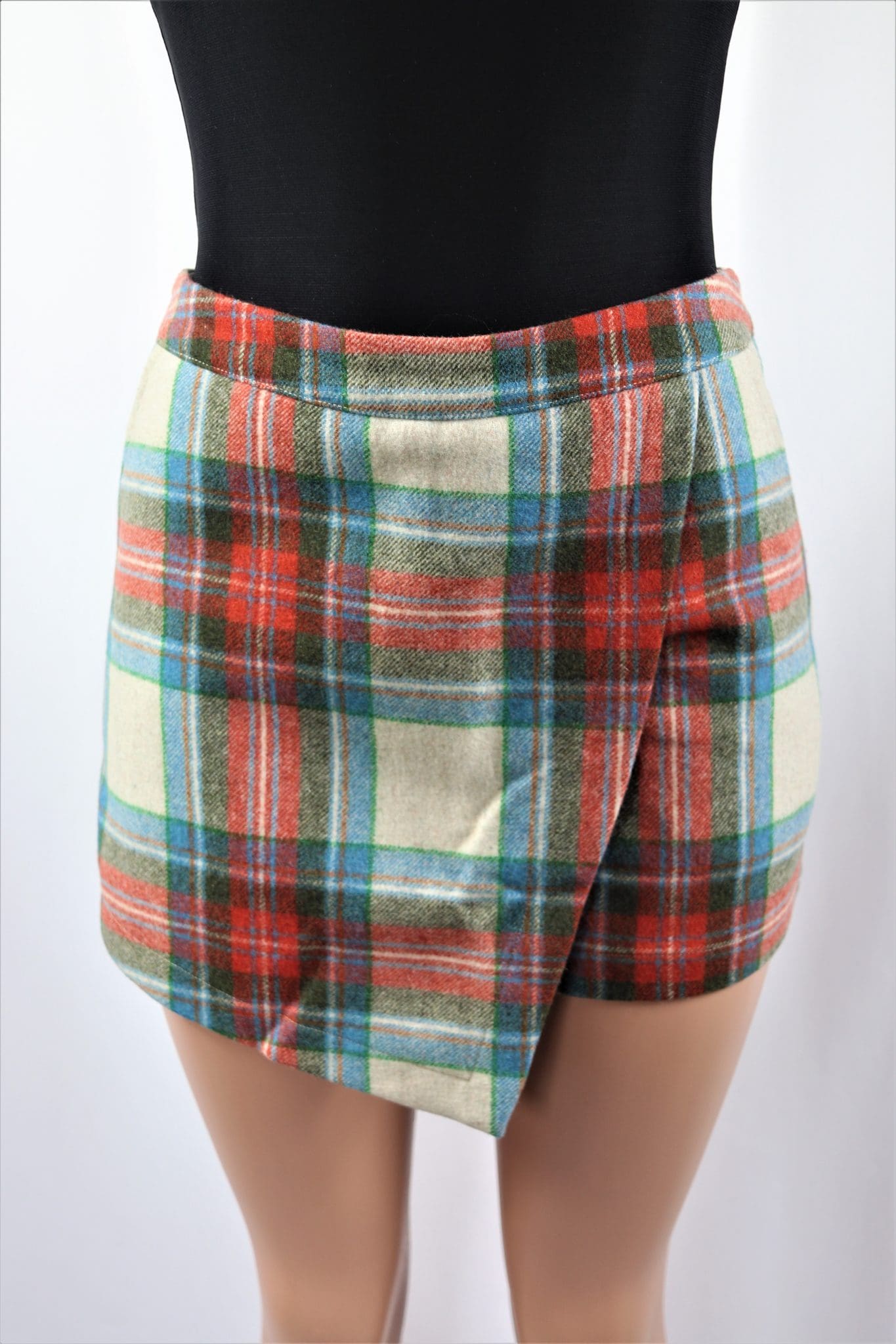 Asymmetric Plaid Skort High waisted multi color wrap plaid skort.