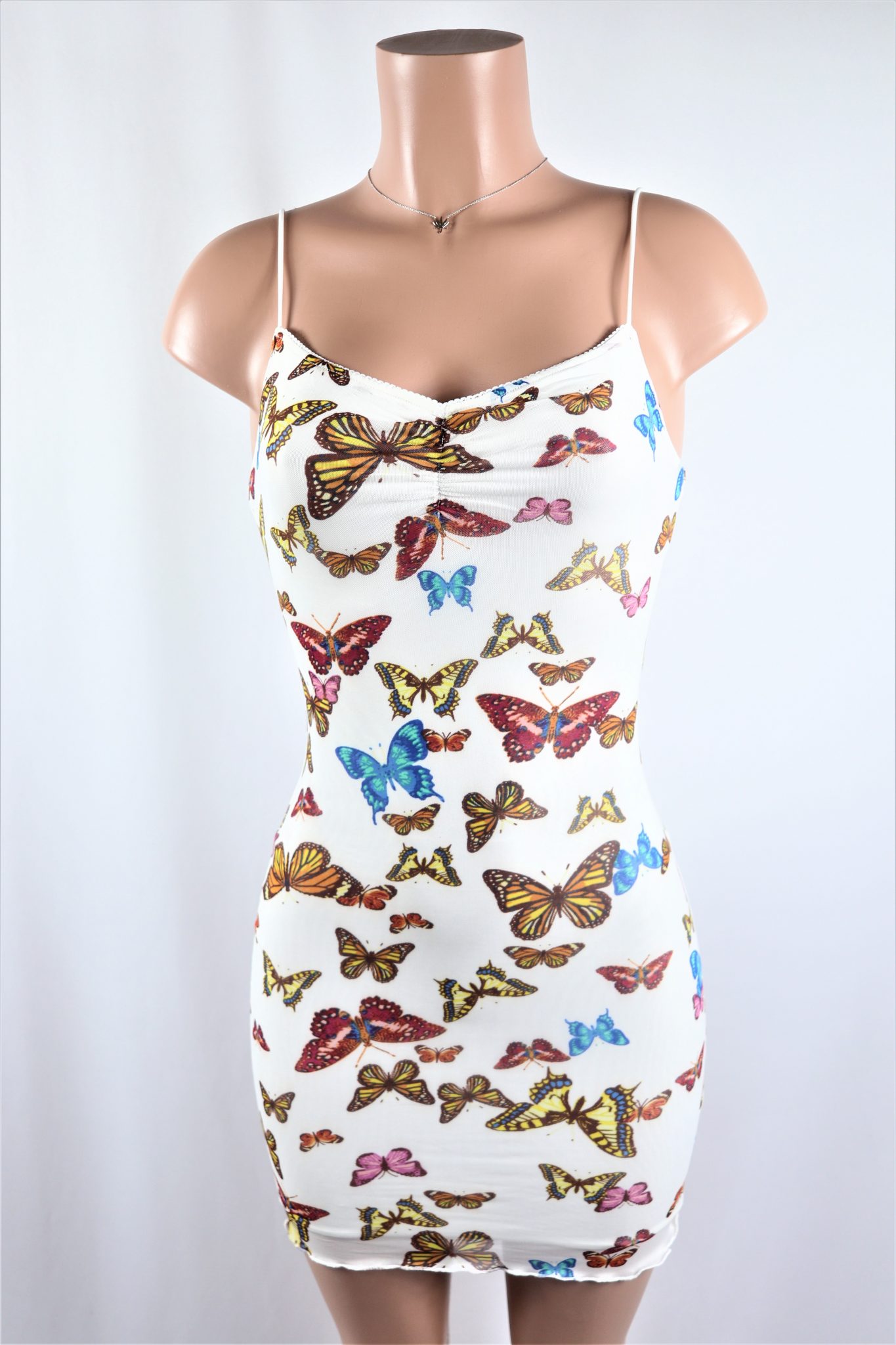 Butterfly Mesh Dress - Multi color butterfly mesh lined mini dress.