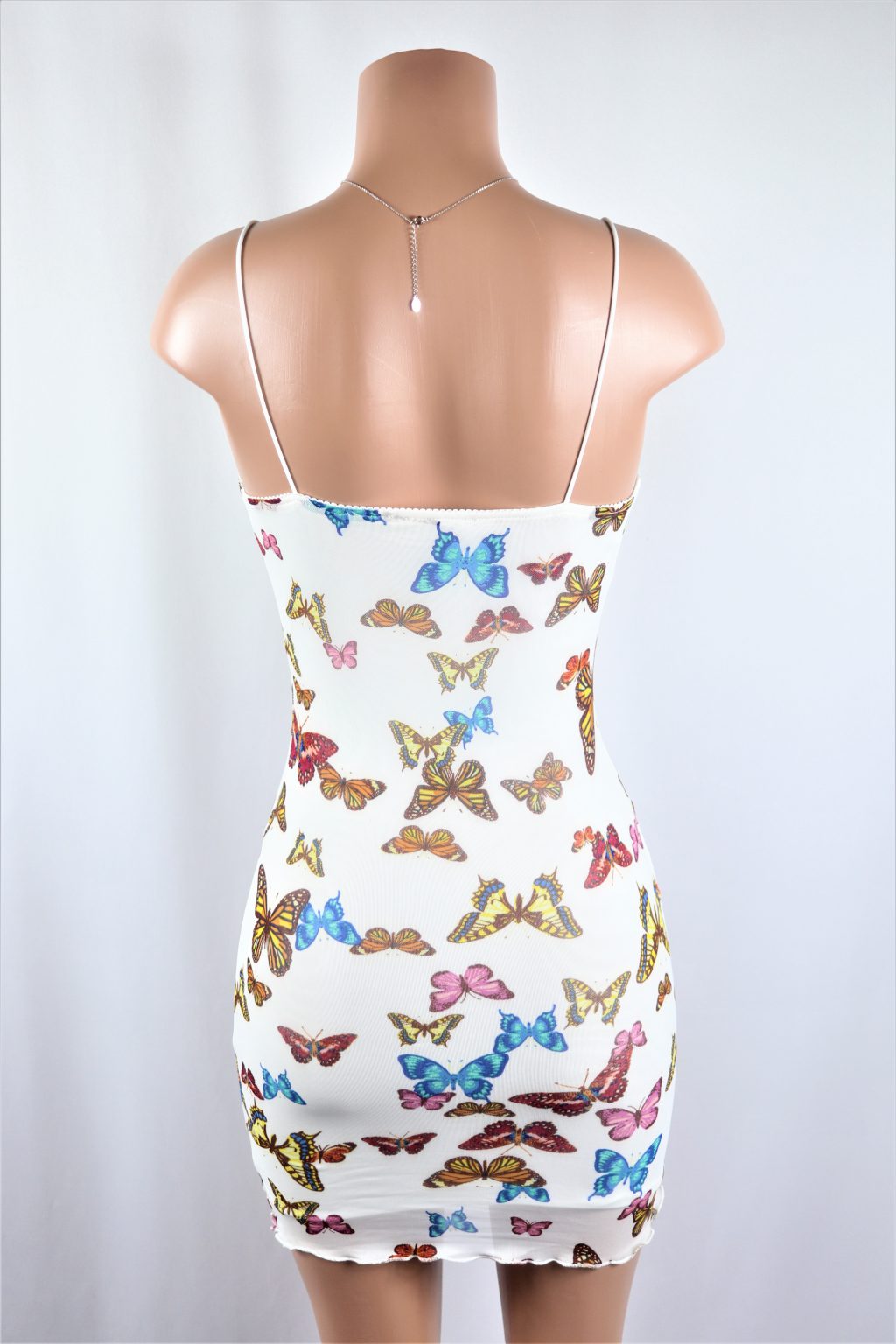 Butterfly Mesh Dress - Multi color butterfly mesh lined mini dress.